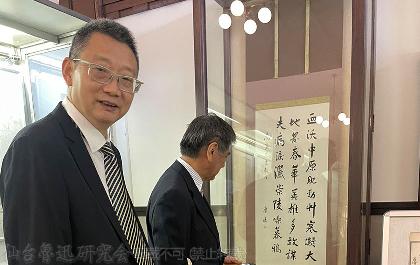 廖久明氏